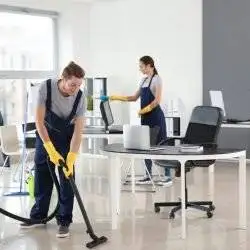 Our team of cleaners cleaning an office